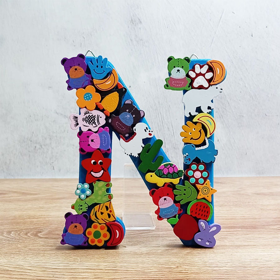 Letters of the alphabet with colorful figures, from  "N" to "T"
