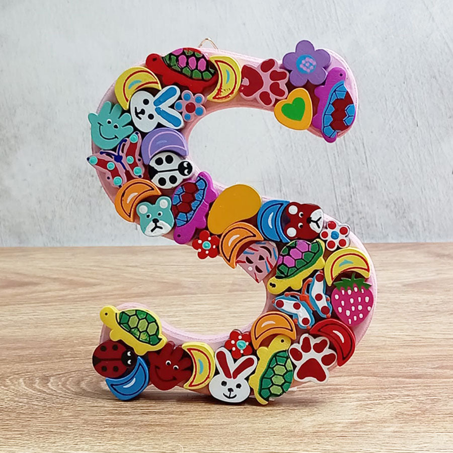 Letras del abecedario con figuritas de colores, de "N" a "T"