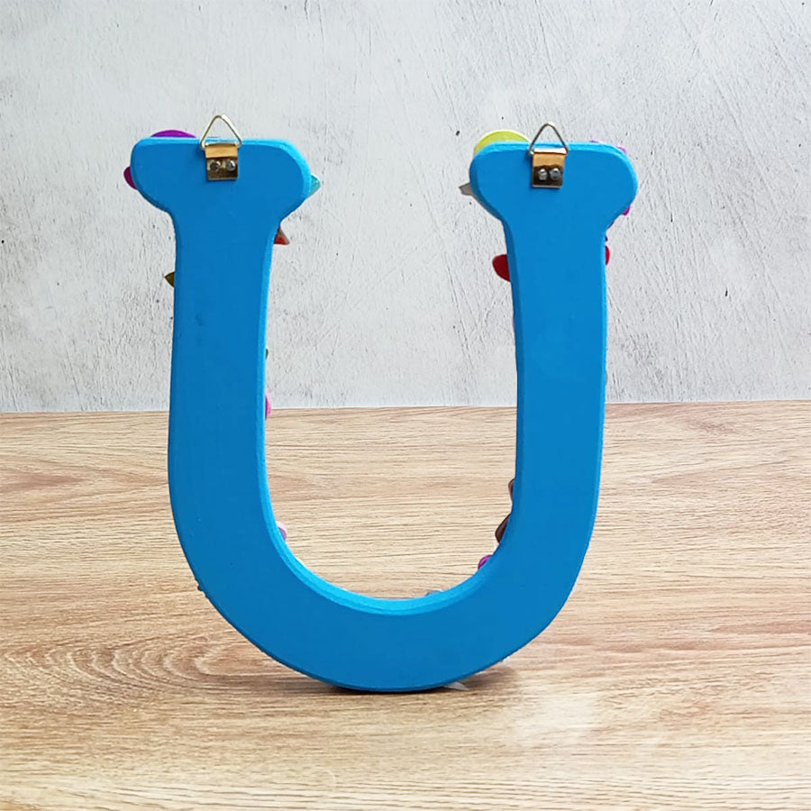 Letters of the alphabet with colorful figures, from  "U" to "Z"