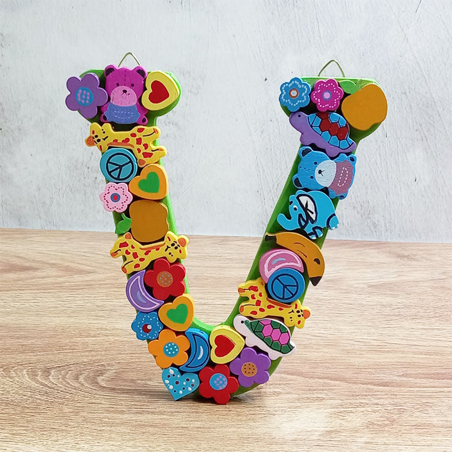 Letras del abecedario con figuritas de colores, de "U" a "Z"