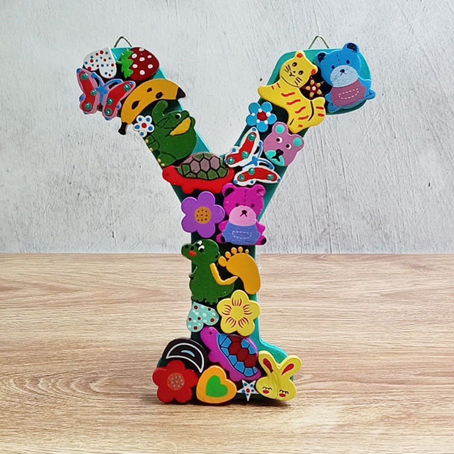Letras del abecedario con figuritas de colores, de "U" a "Z"