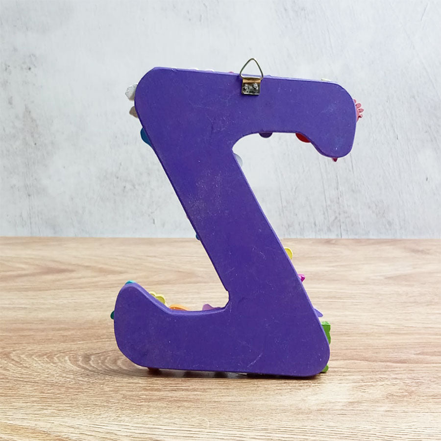 Letras del abecedario con figuritas de colores, de "U" a "Z"