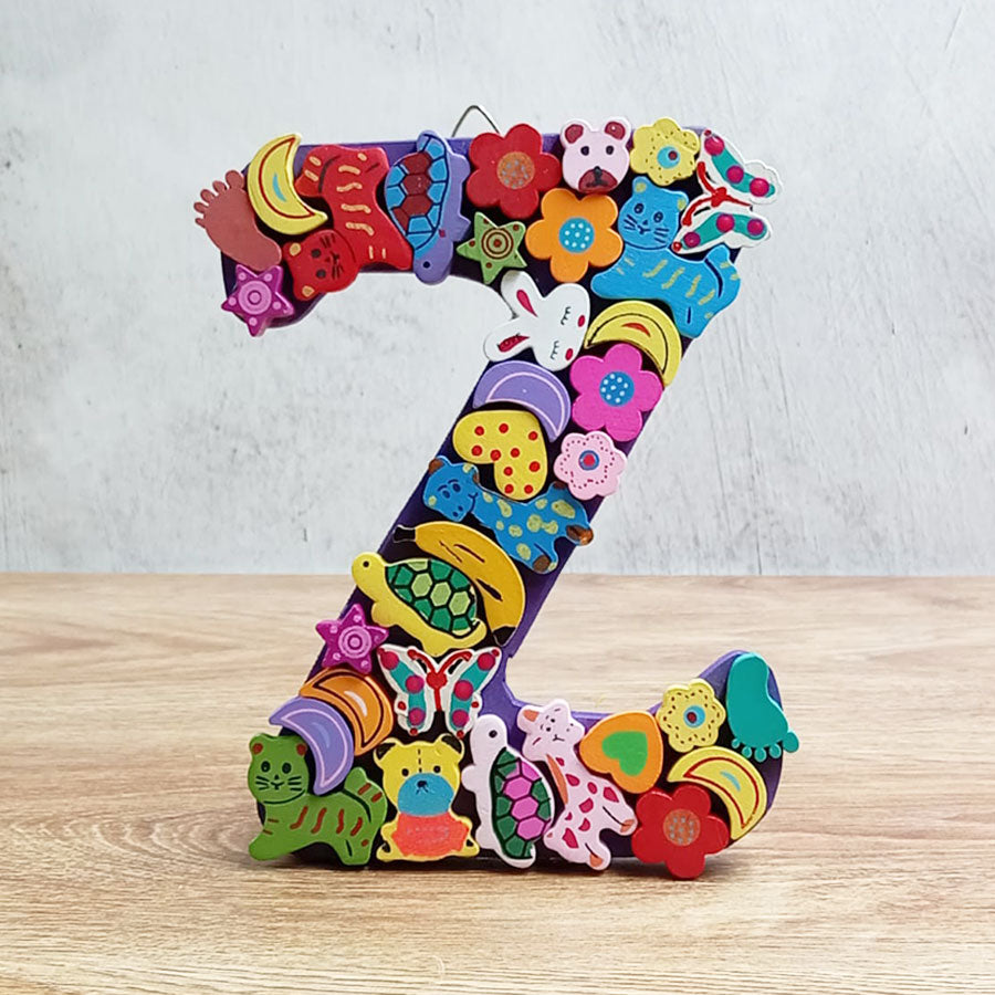 Letras del abecedario con figuritas de colores, de "U" a "Z"