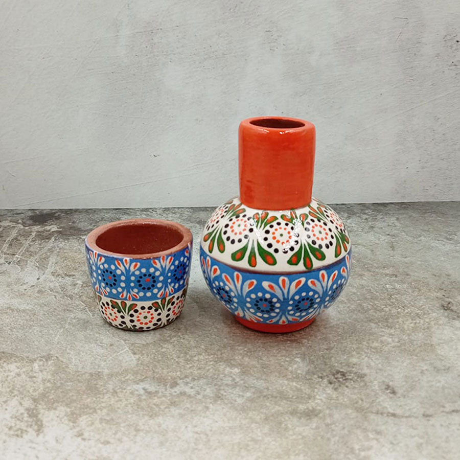 Small decorated decanter and tumbler