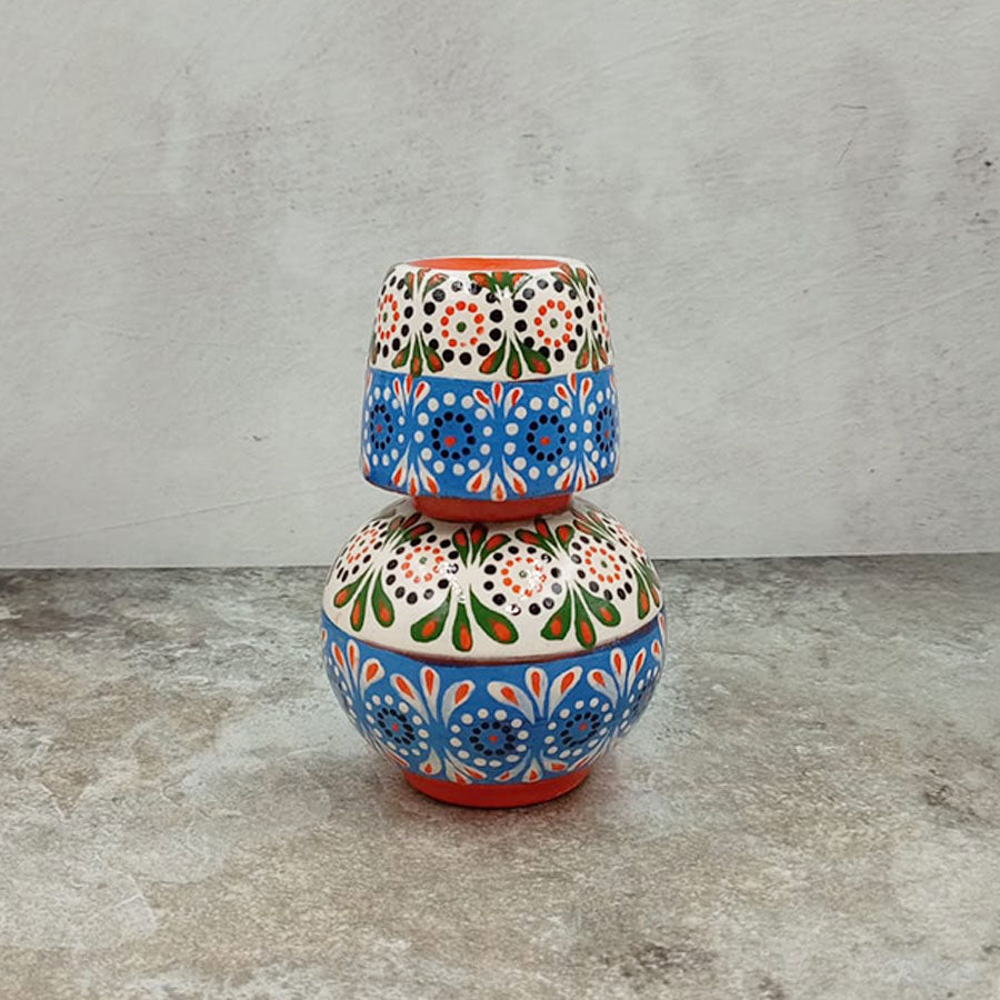 Small decorated decanter and tumbler