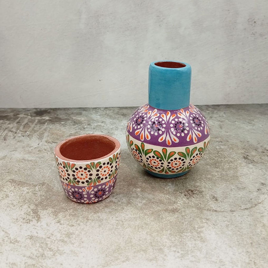 Small decorated decanter and tumbler