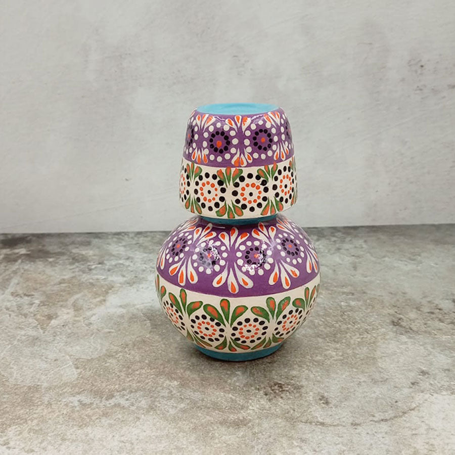 Small decorated decanter and tumbler