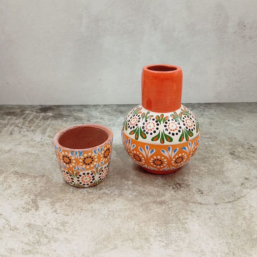Small decorated decanter and tumbler