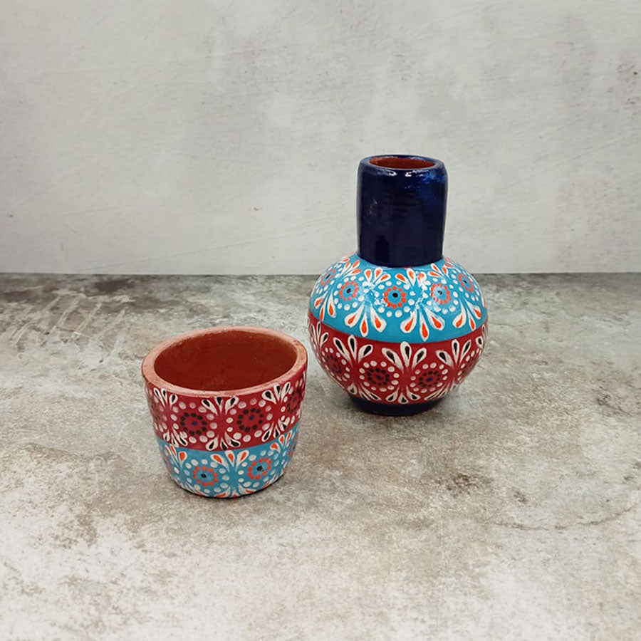 Small decorated decanter and tumbler