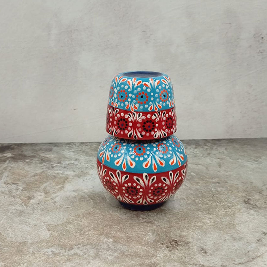 Small decorated decanter and tumbler