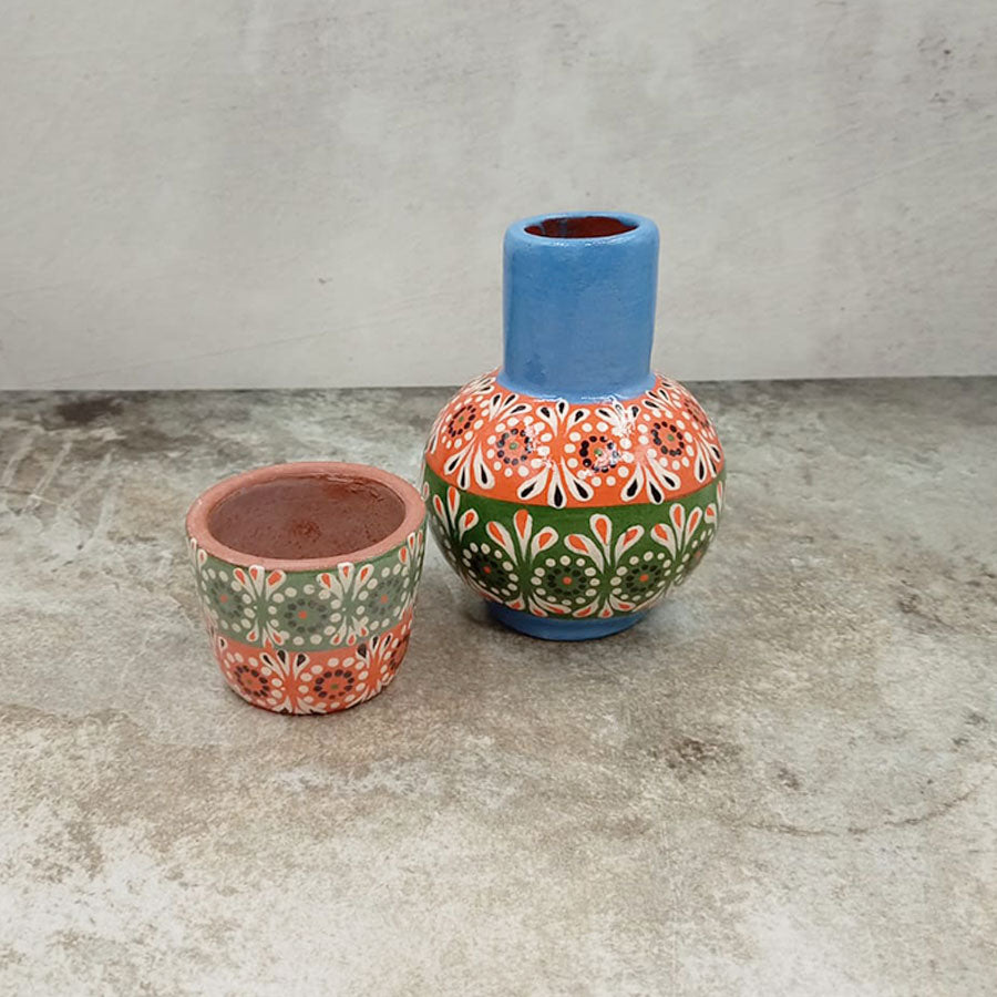 Small decorated decanter and tumbler