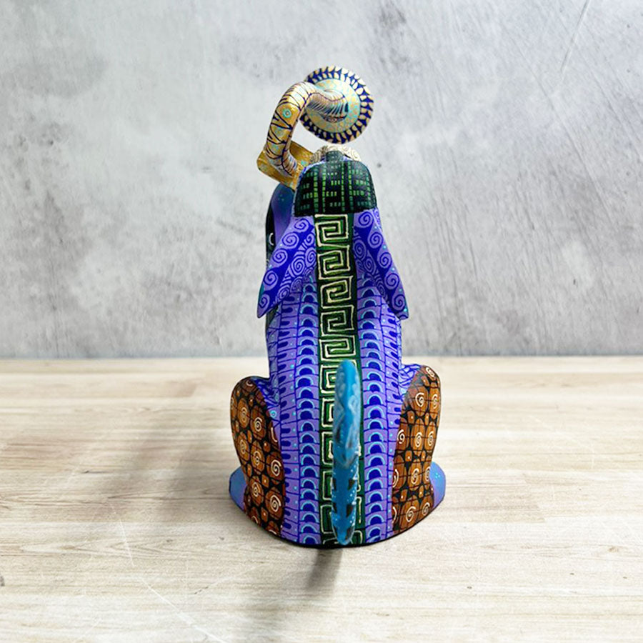 Lobo alebrije violeta con trompeta