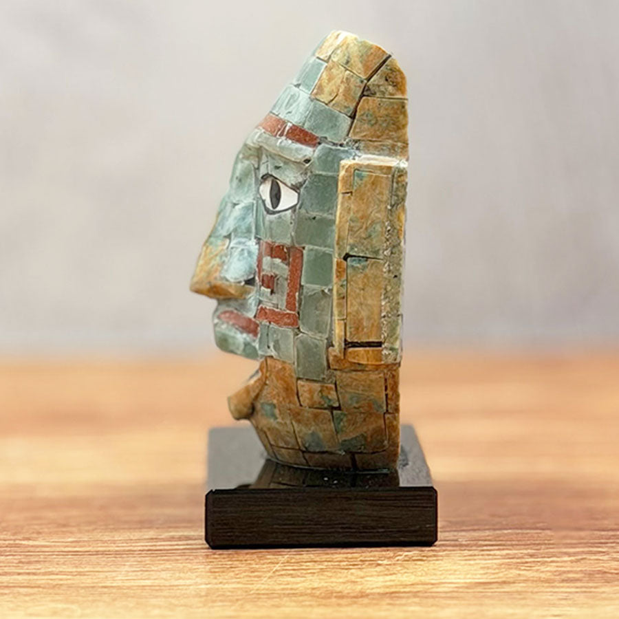 Teotihuacan mask made of obsidian lined with brown and green stone