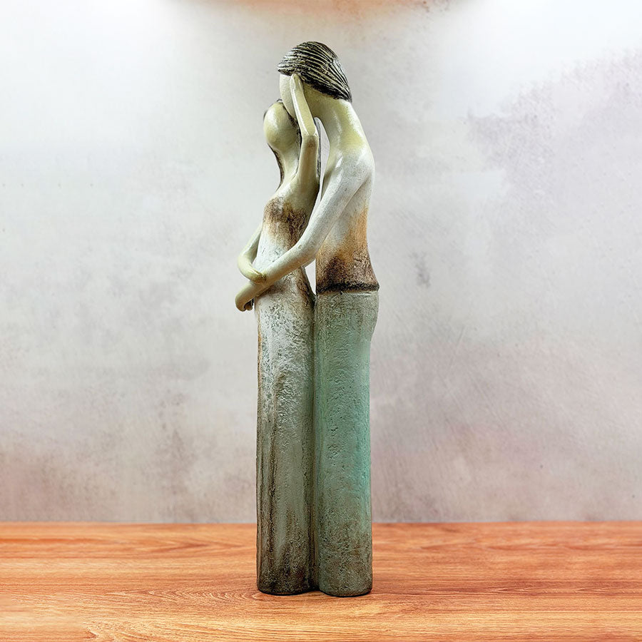Escultura pareja de novios
