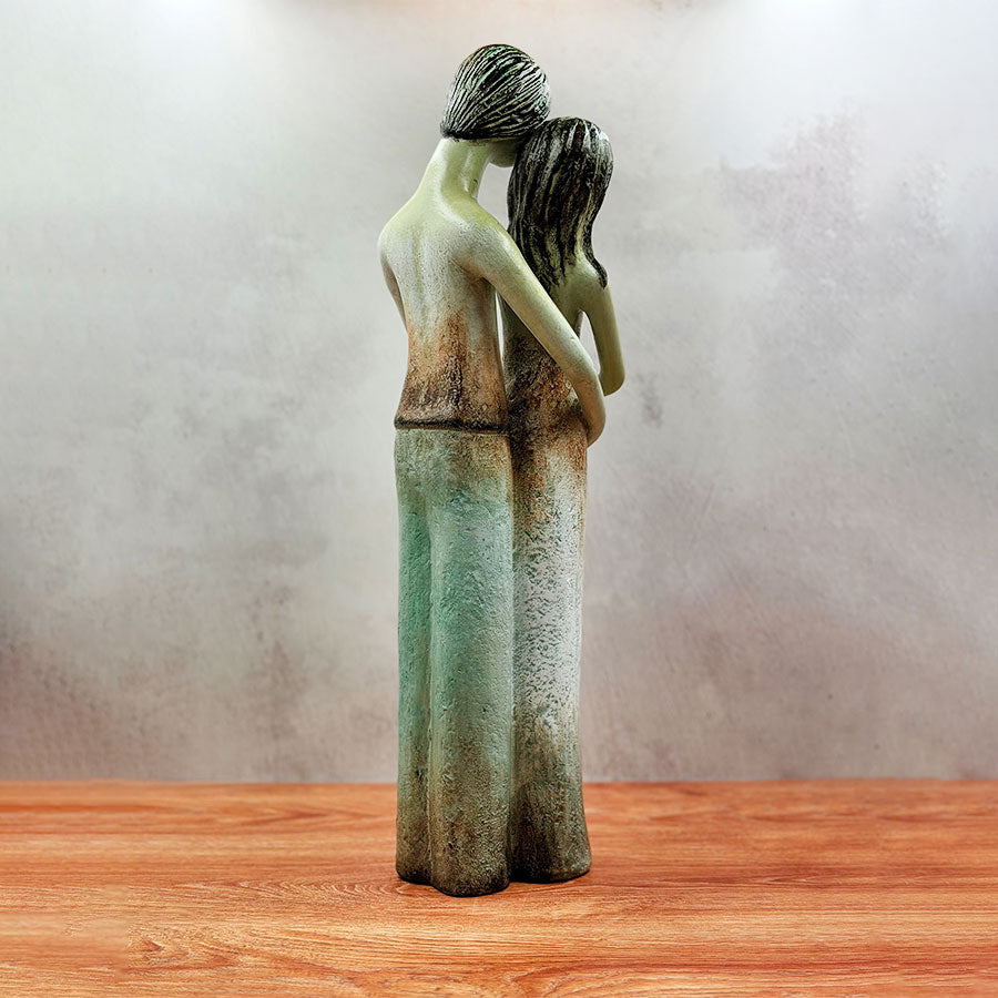 Escultura pareja de novios