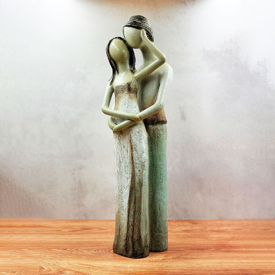 Escultura pareja de novios