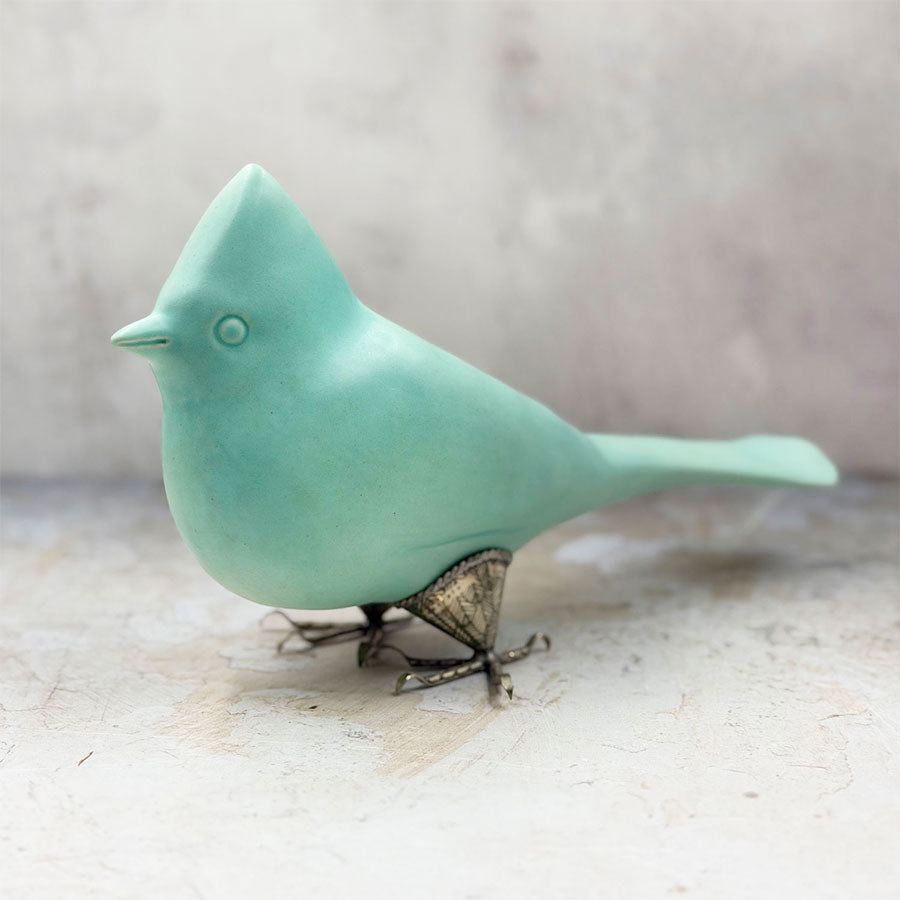 Aqua-colored cardinal bird