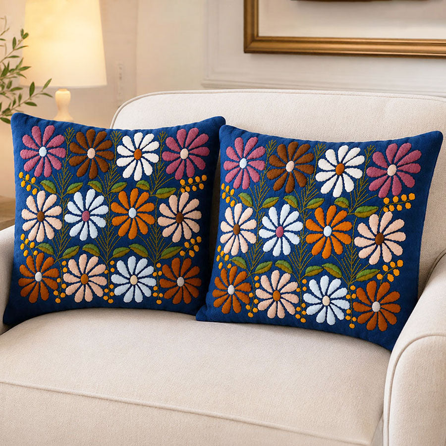 Par de fundas para cojín azul con flores de colores