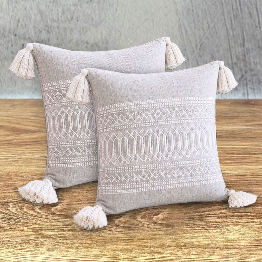 Set of cushion covers in neutral tones and embroidery