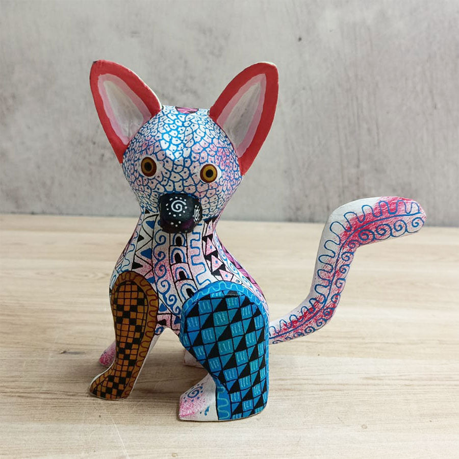 Perrito alebrije blanco y azul