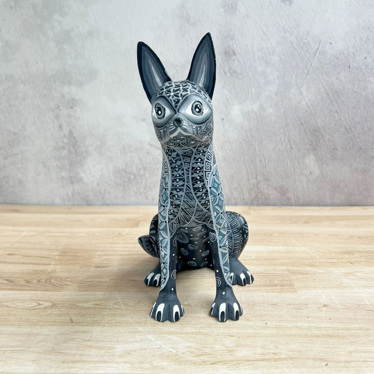 Perrito xoloitzcuintle alebrije negro y gris