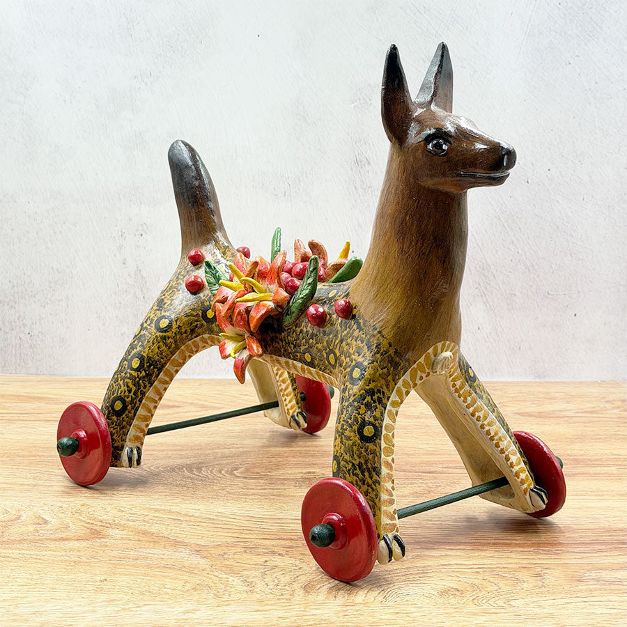 Little dog with wheels