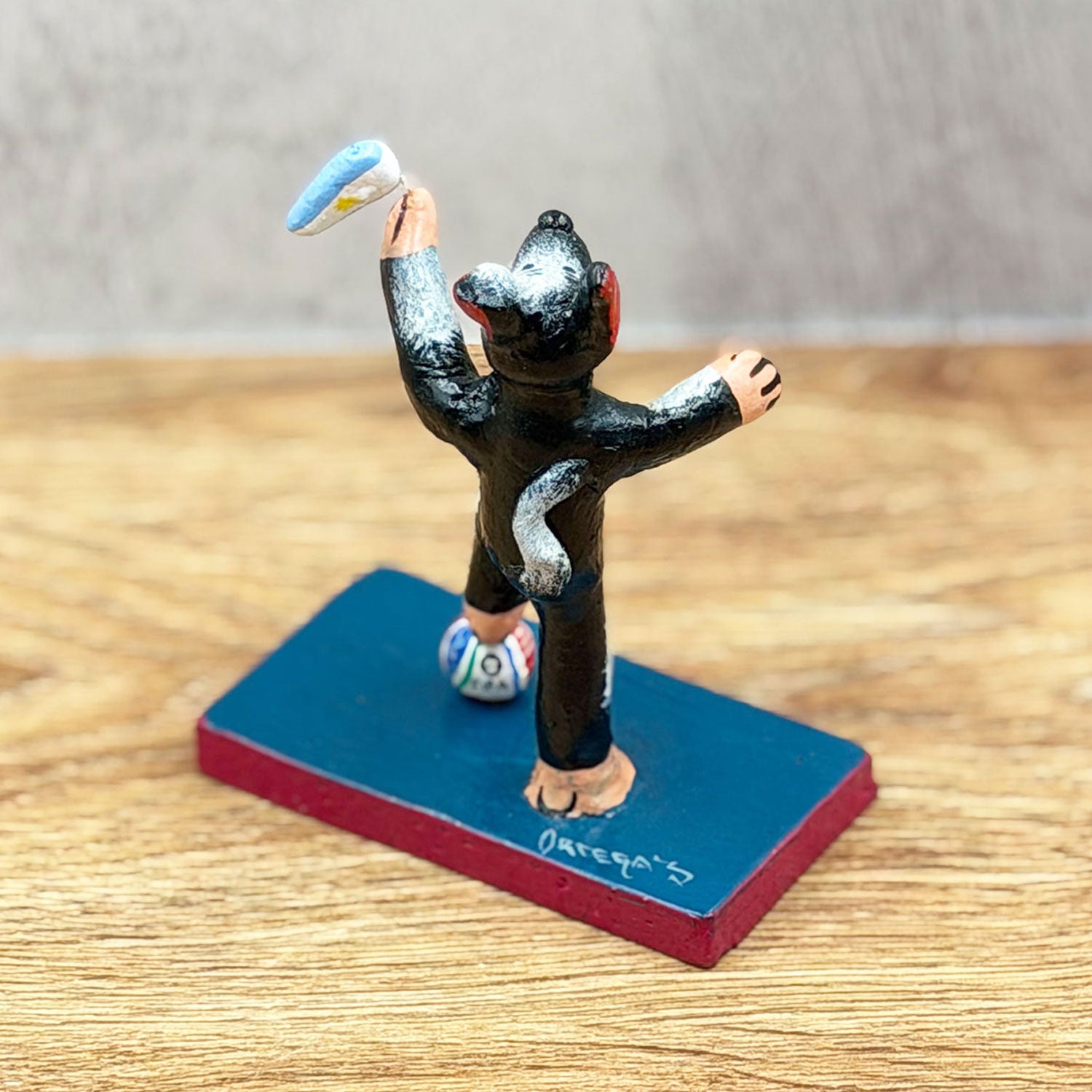 Soccer-playing dog with pennant
