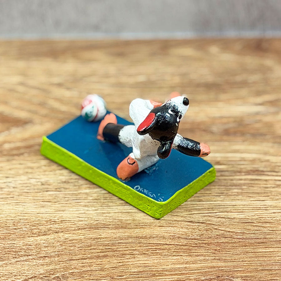 Soccer-playing dog with ball