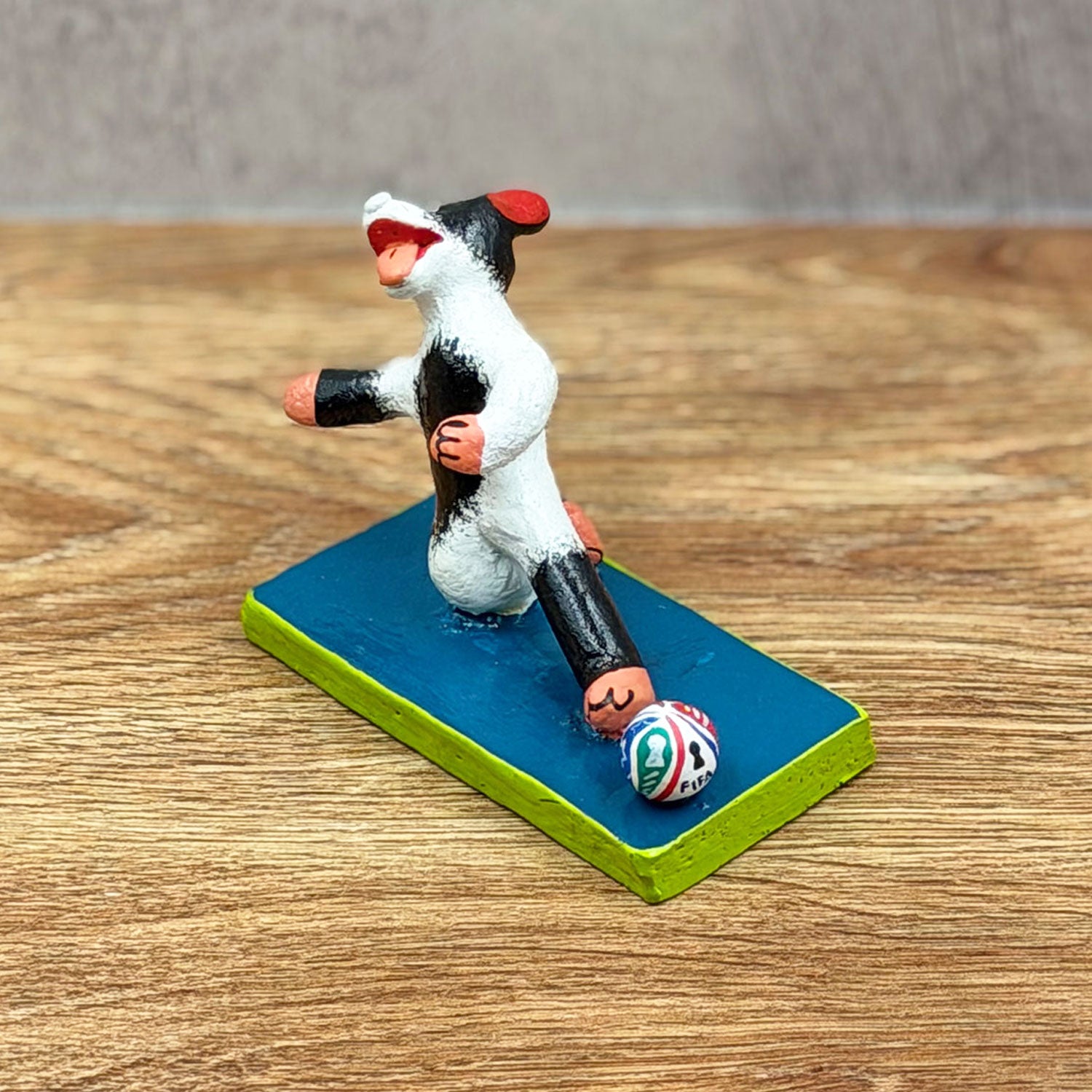 Soccer-playing dog with ball
