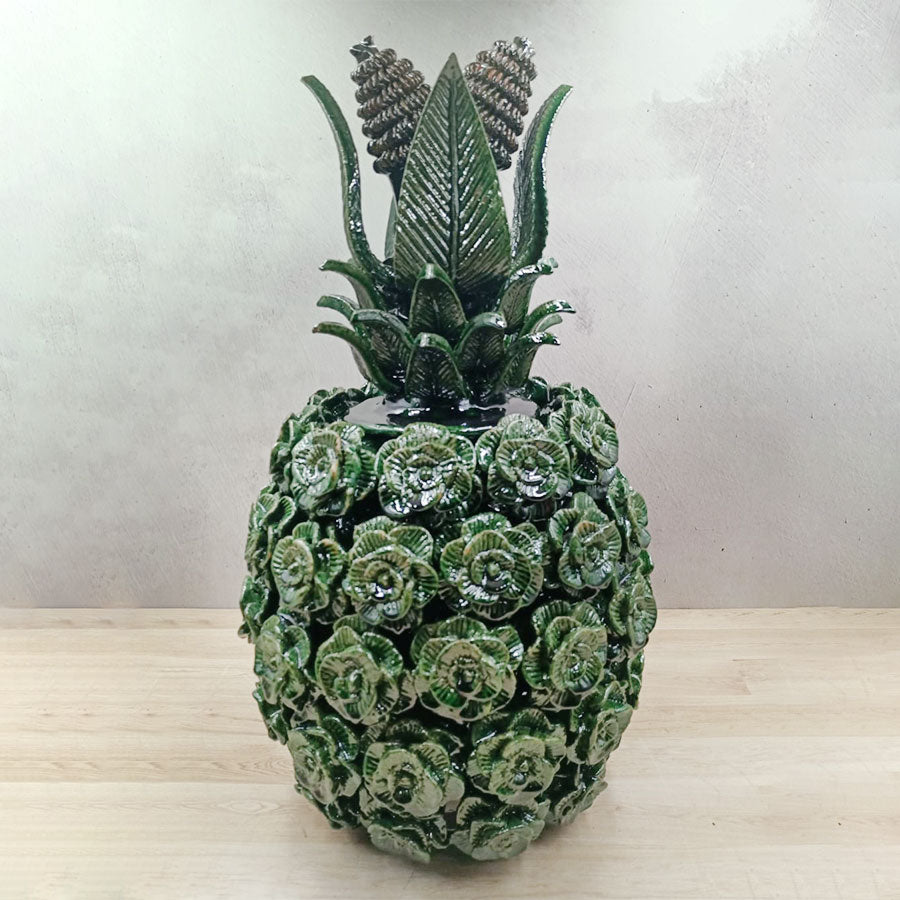 Green pineapple with a rosebush barrel design