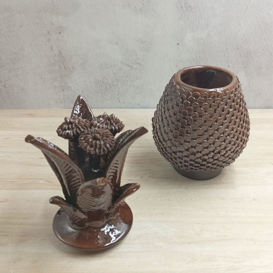Brown pineapple in glazed clay