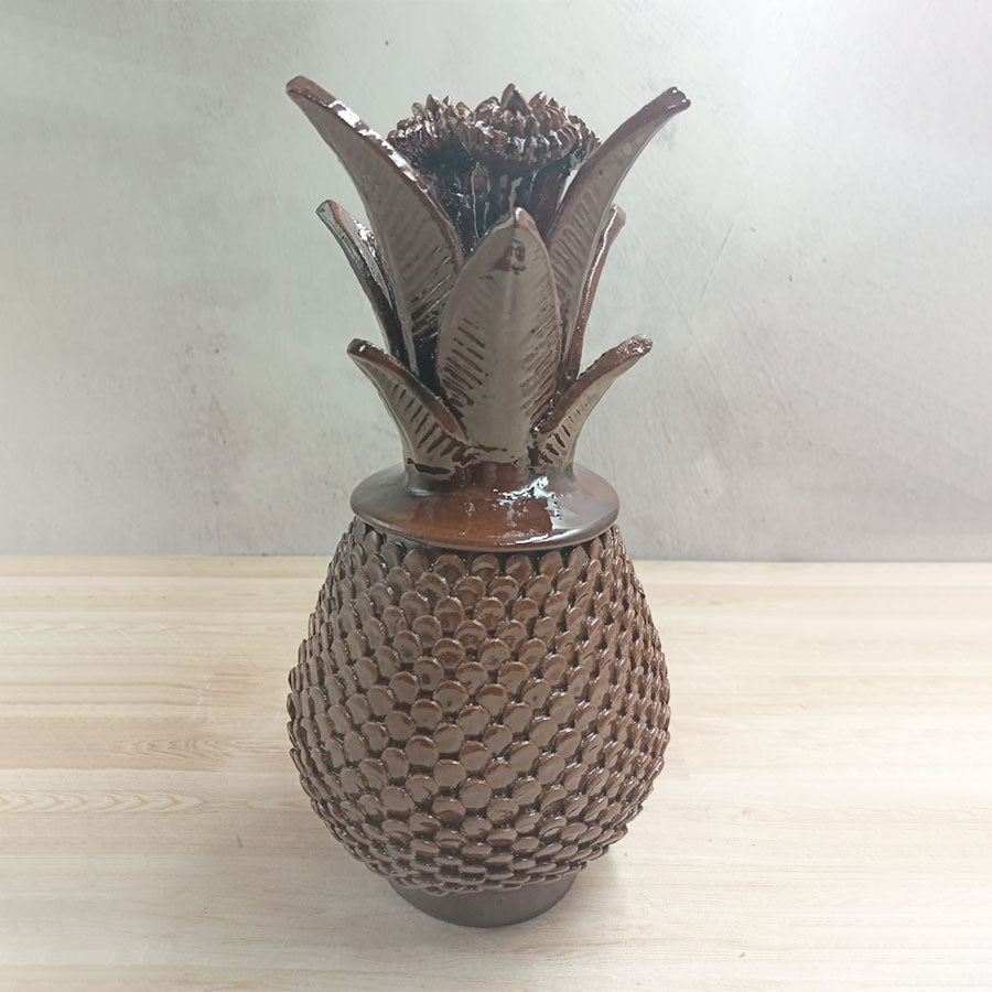 Brown pineapple in glazed clay