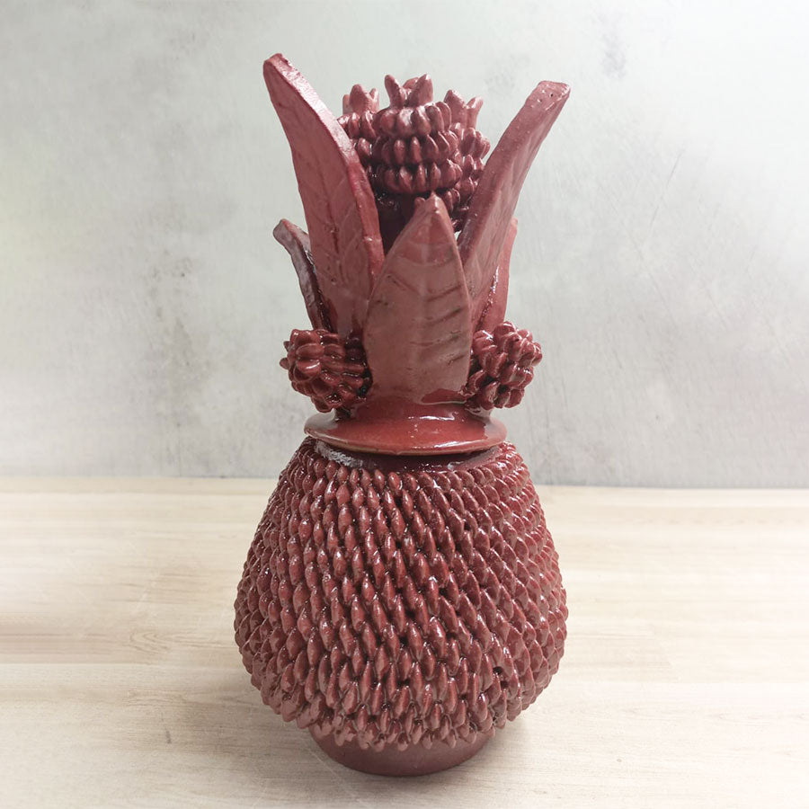 Red pineapple in glazed clay