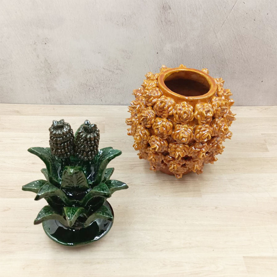 Pineapple with yellow rose design made of glazed clay