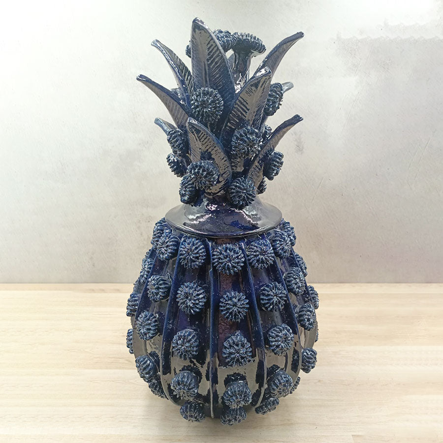 Piña rueditas barro vidriado