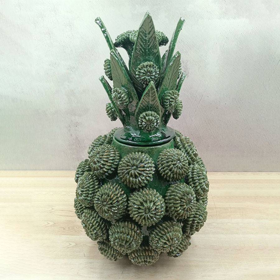 Piña rueditas barro vidriado