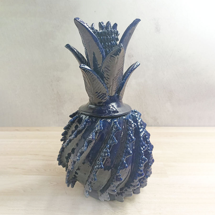 Pineapple with navy blue triangles in glazed clay