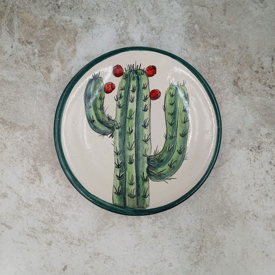 Plate decorated with a green rim