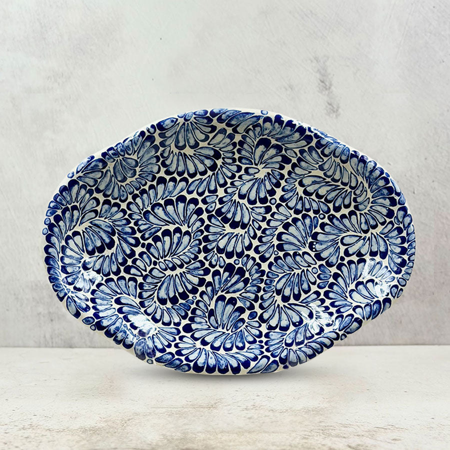 Small blue feathered oval plate