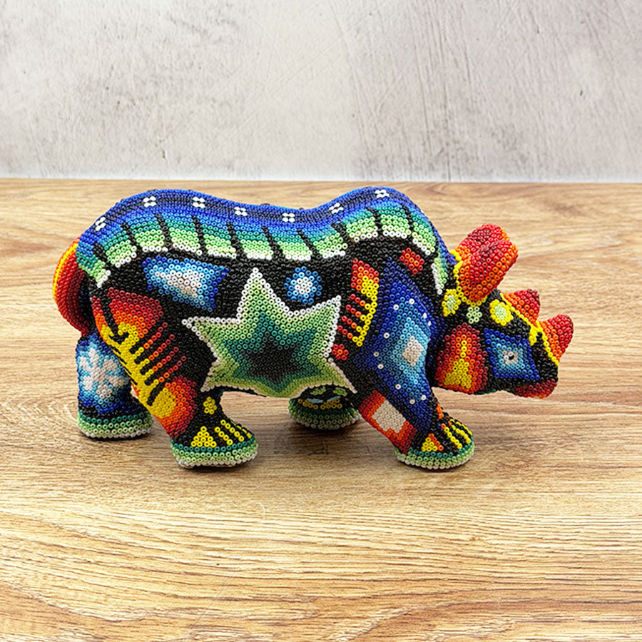 Rhinoceros with Huichol design