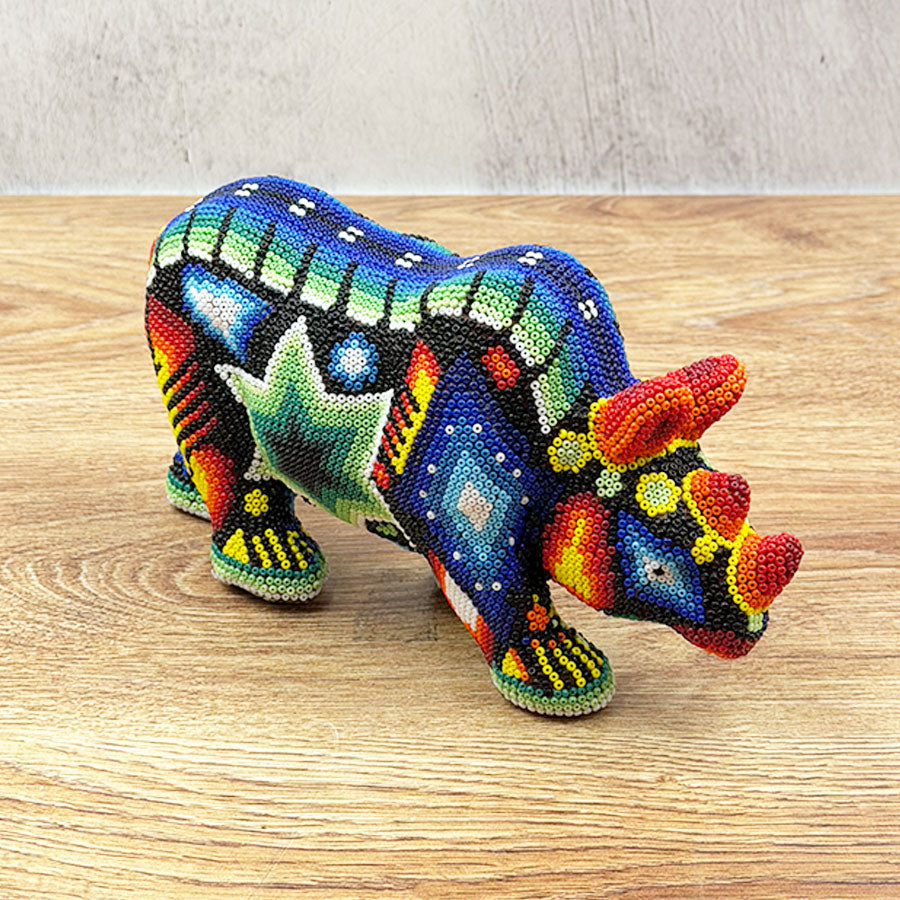 Rhinoceros with Huichol design