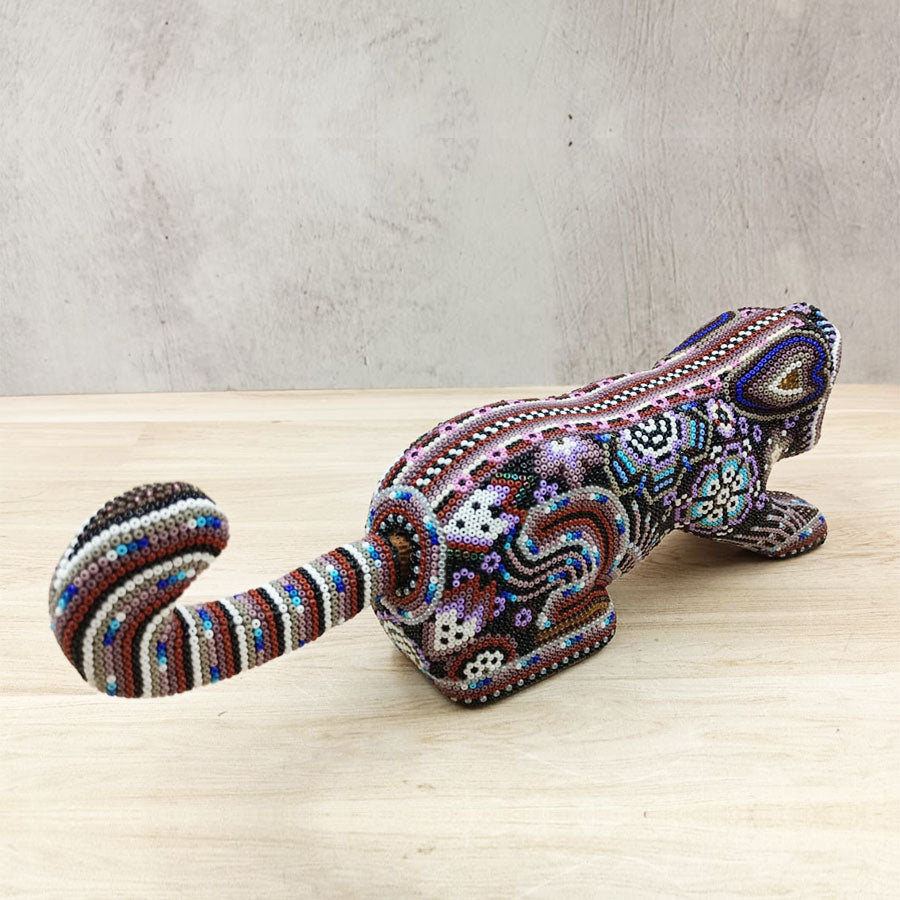 Purple jaguar standing with Huichol Art