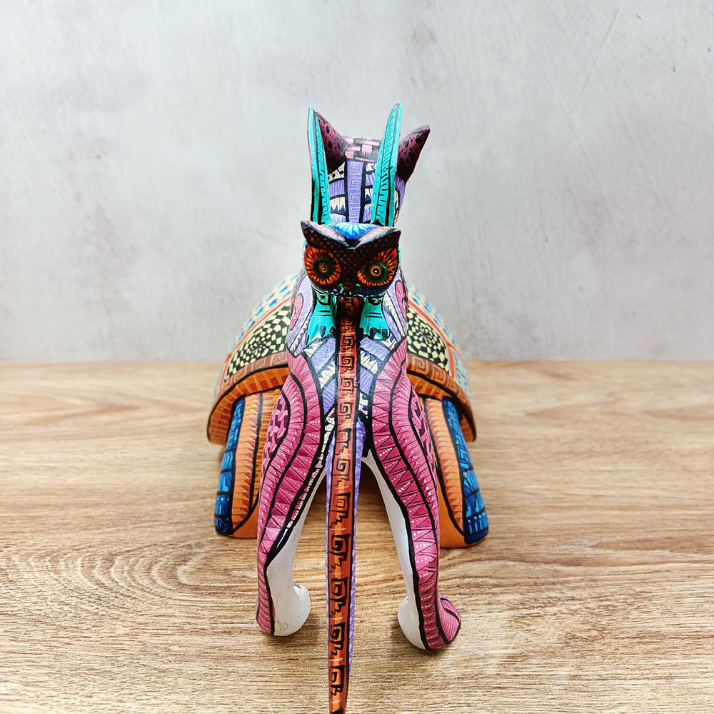 Tortuga alebrije con perrito y búho de colores