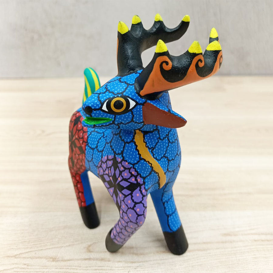 Blue and red alebrije deer