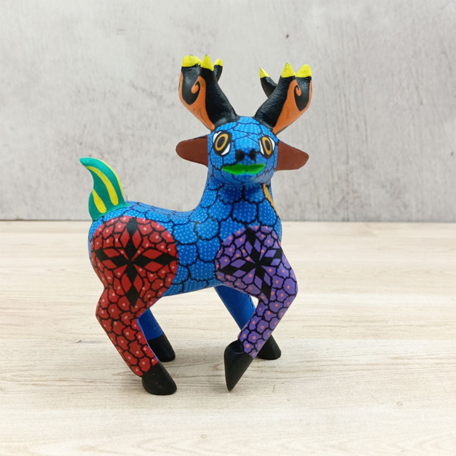 Blue and red alebrije deer