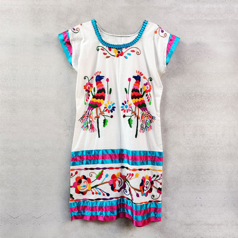 White dress with colorful birds