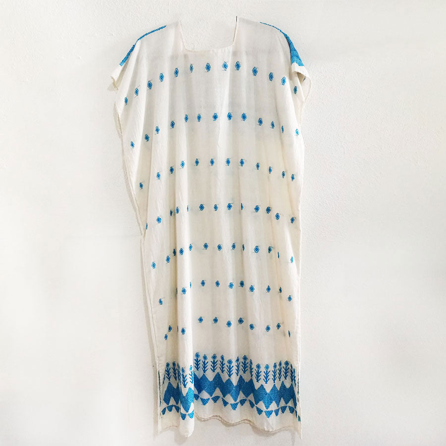 Huipil with turquoise embroidery