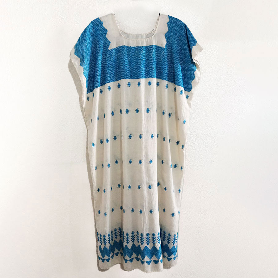 Huipil with turquoise embroidery