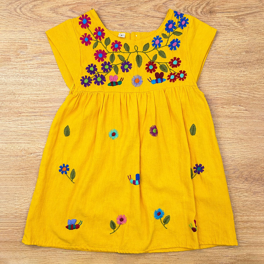 Dress with embroidered colorful flowers and bees