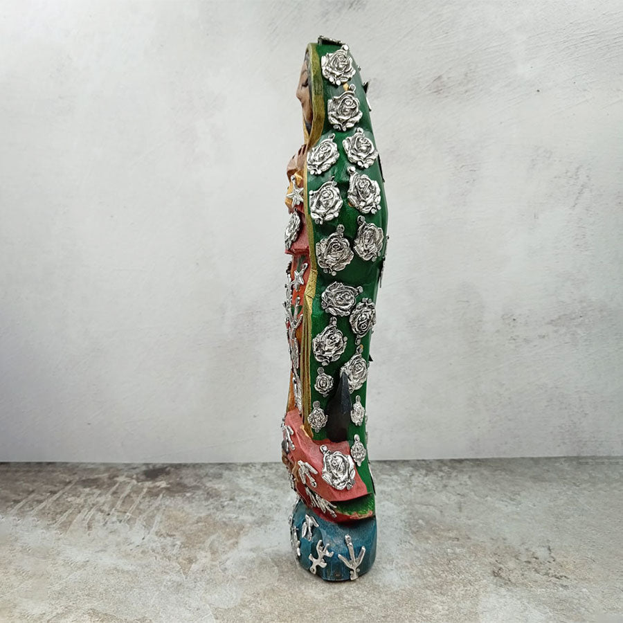 Virgin of Guadalupe with "milagritos"